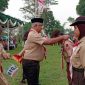 Ketua Harian Kwarcab Kabupaten Bandung, H. Saeful Bachri, S.H. MAP, saat pembukaan Lomba Tingkat III (LT-III) Gerakan Pramuka Kabupaten Bandung 2026 di Perkemahan Pondok Pesantren Al-Mukhlis Cangkuang, Jumat (9/10/2026) petang. 